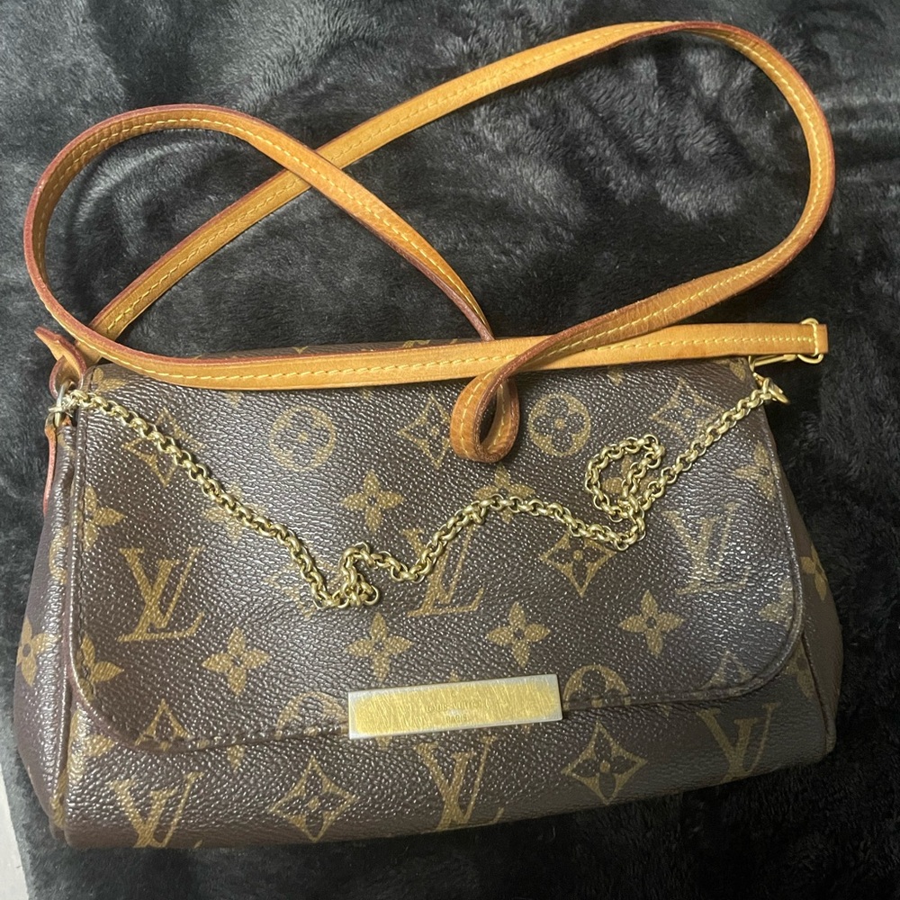 Authentic MM monogram clutch